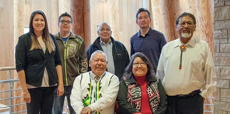 (standing l-r) Council Member Heather VanZile, Treasurer Richard Gougé, Vice Chair Hartford Shegonee, Council Member Brooks Boyd, Judge Eugene “Fugie” White-Fish, (seated) Chair Harold “Gus” Frank, Secretary Lorna Shawano