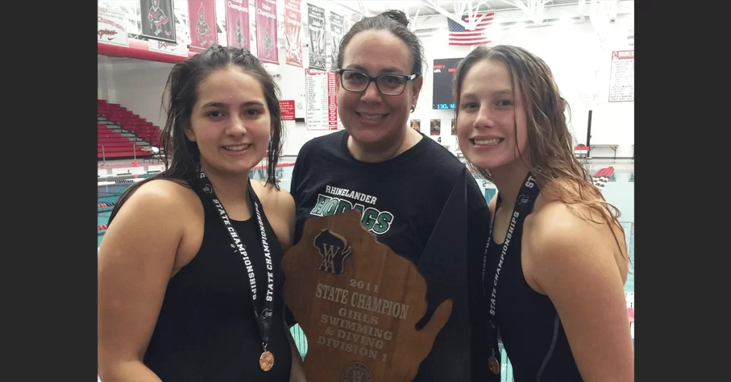 Forest County tribal members and sisters Makenna and Abi Winnicki have something to celebrate with their Hodag girls swim team: