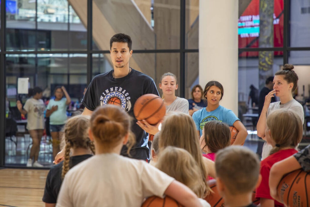 The Forest County Potawatomi (FCP) community had a special guest visit July 21 and 22, 2022, at the Potawatomi Community Center, Bronson Koenig, who was a former Wisconsin Badger basketball player.